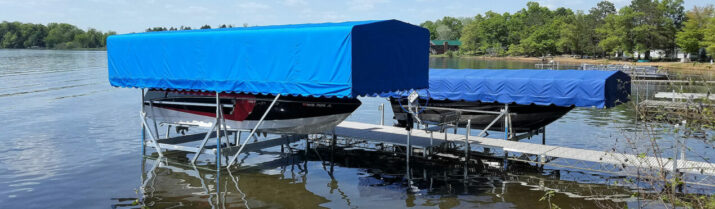 two sizes of boat lifts with canopies off a portable sectional dock
