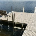 L-Dock section with decking, dock ladder and bench in water
