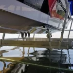 view underneath a boat lifted by boat lift