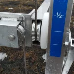 blue ruler on boat lift