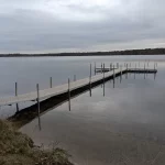 custom sectional dock leading into a lake