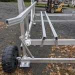 side view of boat lift with tire