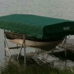 boat lift with green canopy