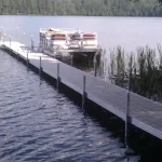 boat anchored at a custom sectional dock