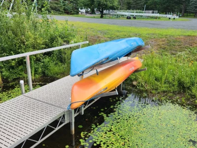 Kayak Rack attached to dock holding two kayaks