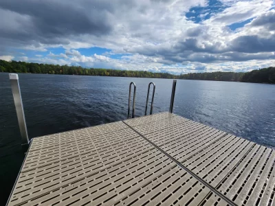 8x8' Patio, Titan Maintenance Free Decking, & Aluminum swim ladder.